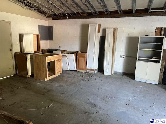 kitchen featuring concrete flooring