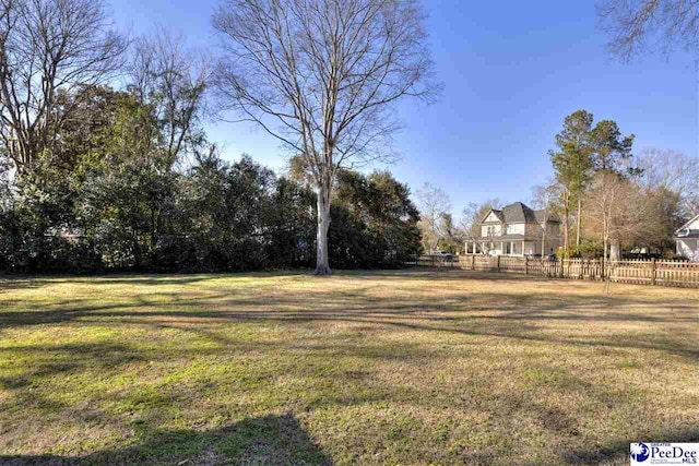 view of yard featuring fence