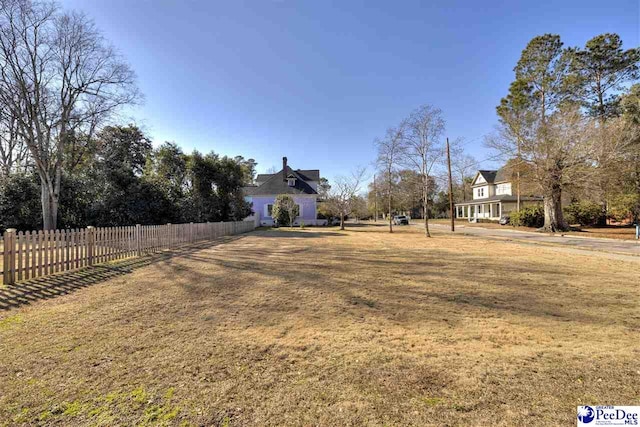 view of yard featuring fence