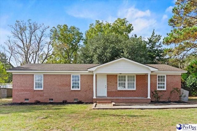 single story home featuring a front yard