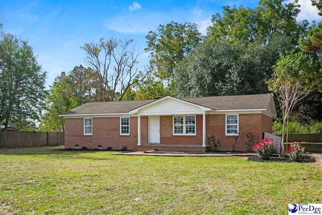 ranch-style house with a front yard