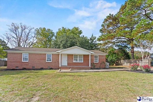 ranch-style house with a front yard