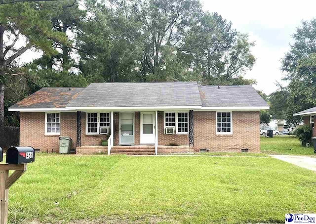 single story home featuring a front yard