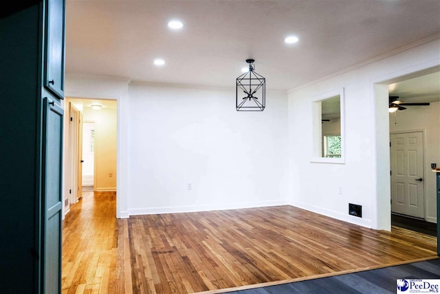 306 Mimosa Dr, Cheraw, SC 29520 - unfurnished dining area with light wood-style floors, recessed lighting, ceiling fan, and crown molding