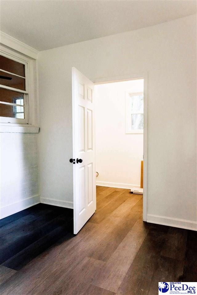 306 Mimosa Dr, Cheraw, SC 29520 - empty room featuring wood finished floors