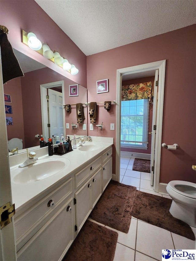 129 Golf Course Rd, Hartsville, SC 29550 - full bath featuring toilet, double vanity, tile patterned flooring, and a textured ceiling