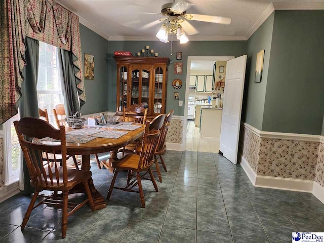 129 Golf Course Rd, Hartsville, SC 29550 - dining area featuring plenty of natural light, ceiling fan, baseboards, ornamental molding, and dark tile patterned floors