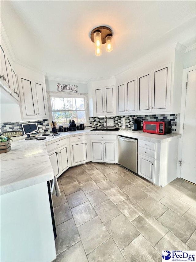 kitchen featuring stainless steel dishwasher, decorative backsplash, white microwave, and a sink