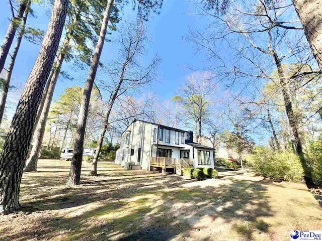 view of front of property with a deck