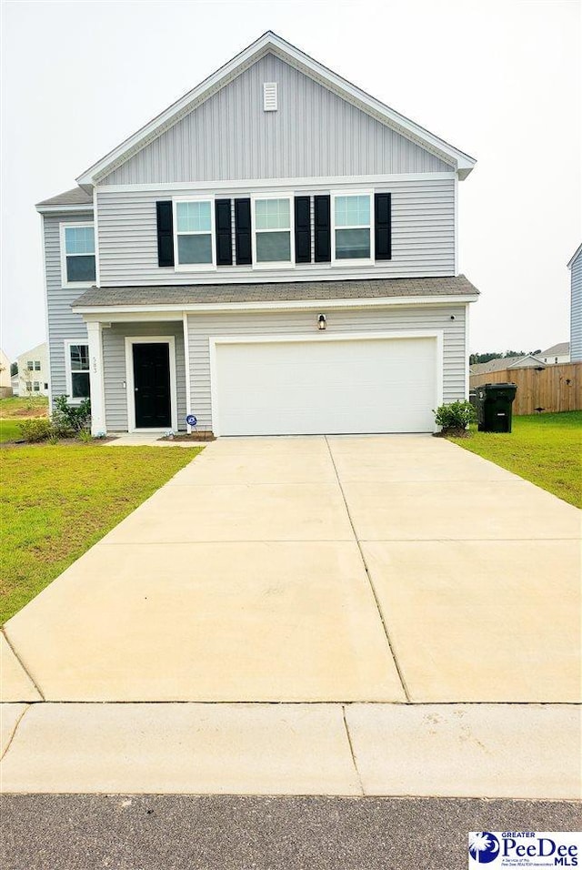 583 Polaris Way, Summerville, SC 29486 - view of front facade with concrete driveway, an attached garage, and board and batten siding