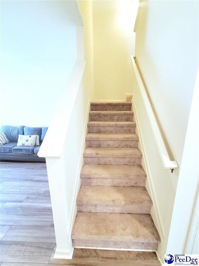 583 Polaris Way, Summerville, SC 29486 - stairway with wood finished floors and baseboards