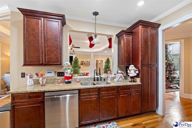 kitchen with light hardwood / wood-style flooring, dishwasher, pendant lighting, ornamental molding, and sink