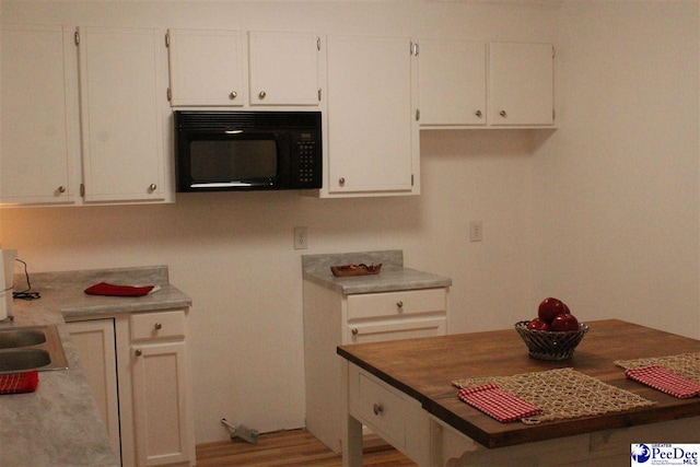 kitchen with white cabinetry