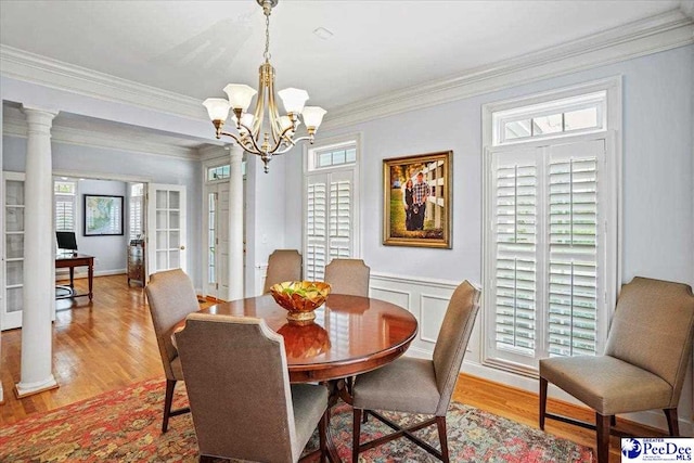 2543 Ben Hogan Cir, Florence, SC 29506 - dining space with light wood finished floors, a wealth of natural light, and crown molding