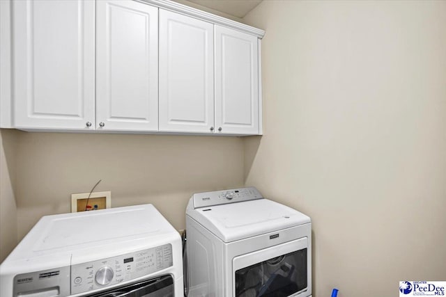 2543 Ben Hogan Cir, Florence, SC 29506 - laundry area featuring independent washer and dryer and cabinet space