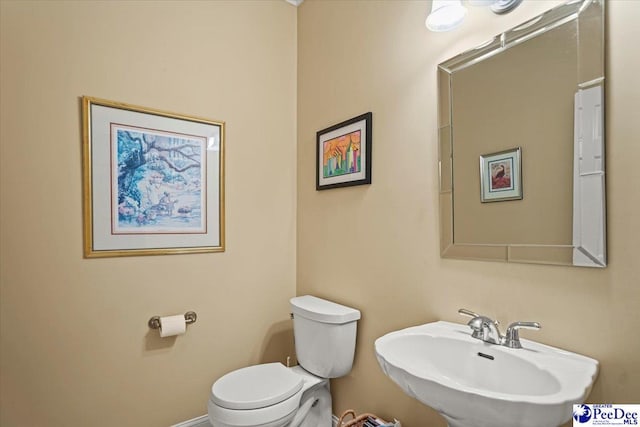 2543 Ben Hogan Cir, Florence, SC 29506 - half bath with toilet and a sink