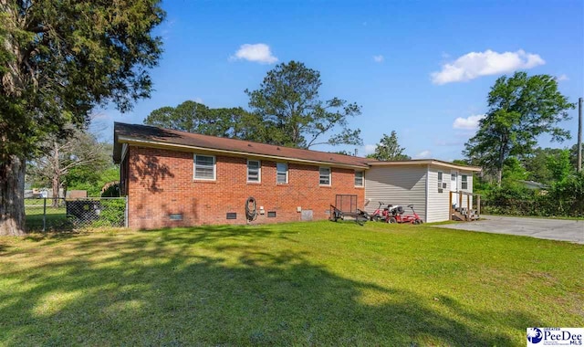 3518 Leigh Ln, Florence, SC 29505 - rear view of property with crawl space and brick siding
