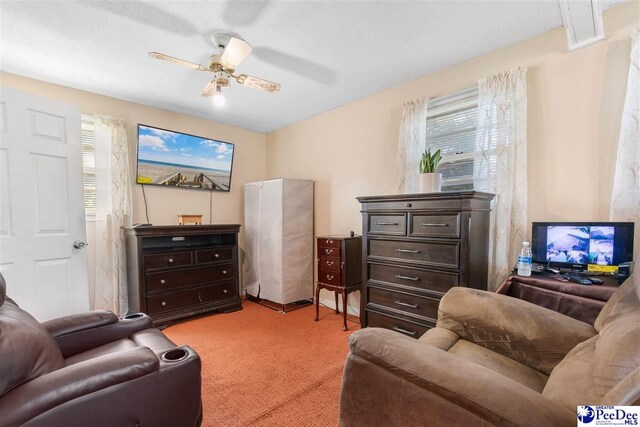 3518 Leigh Ln, Florence, SC 29505 - living room featuring a ceiling fan and light carpet
