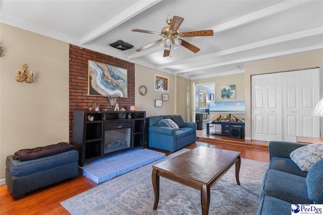 3518 Leigh Ln, Florence, SC 29505 - living room featuring wood finished floors, beamed ceiling, and ceiling fan