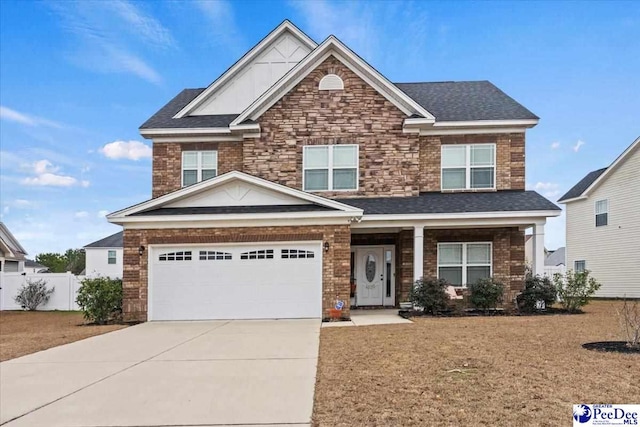 craftsman house featuring a garage