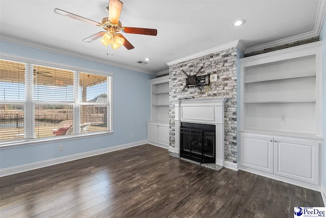 unfurnished living room with ornamental molding, dark wood-type flooring, ceiling fan, and built in shelves