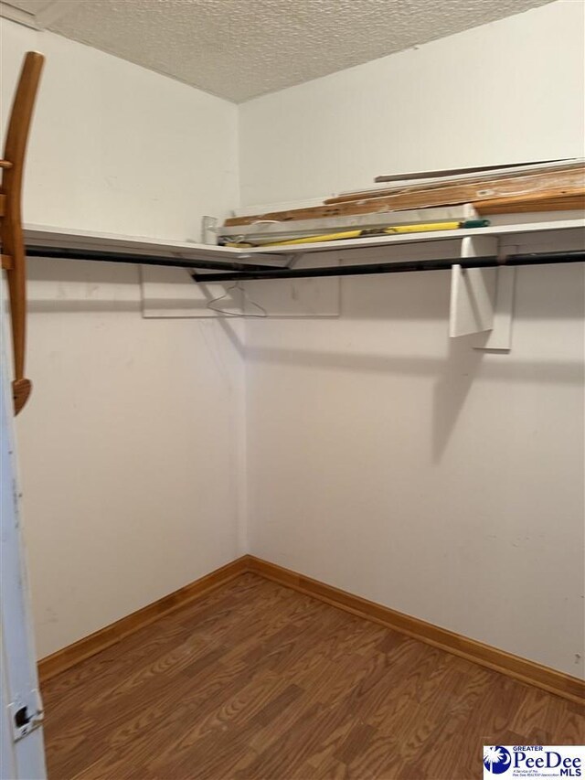 1343 Floyd Dr, Lake City, SC 29560 - walk in closet featuring hardwood / wood-style flooring
