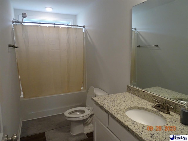 1671 Lake Wateree Dr, Florence, SC 29501 - bathroom featuring toilet, shower / bath combo, and vanity