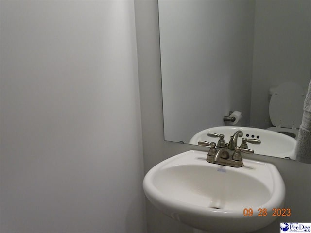 1671 Lake Wateree Dr, Florence, SC 29501 - half bathroom with a sink
