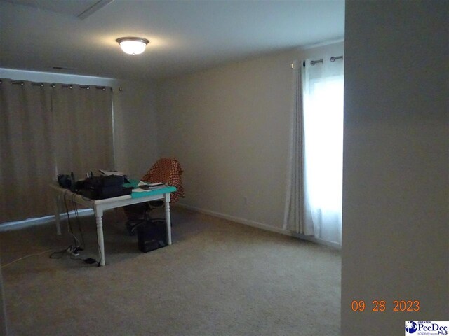 1671 Lake Wateree Dr, Florence, SC 29501 - carpeted office space featuring baseboards