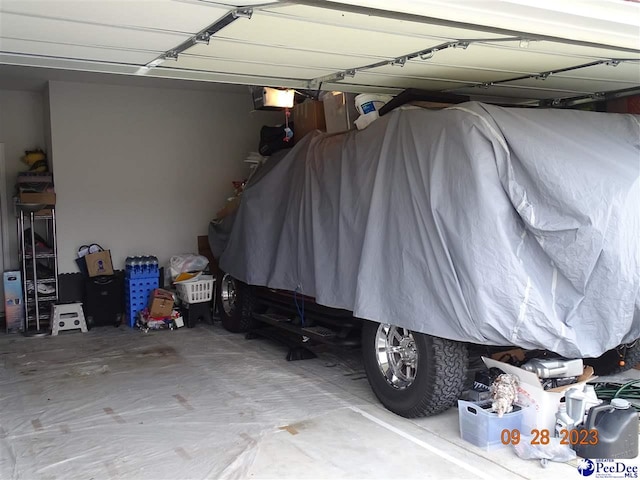 1671 Lake Wateree Dr, Florence, SC 29501 - garage featuring a garage door opener