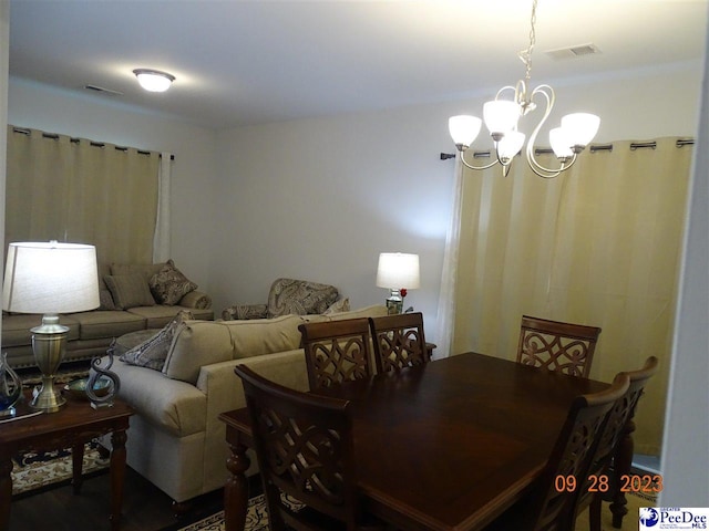 1671 Lake Wateree Dr, Florence, SC 29501 - dining area with a chandelier