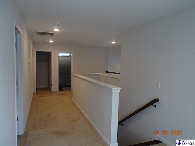 1671 Lake Wateree Dr, Florence, SC 29501 - hall featuring an upstairs landing, recessed lighting, and light colored carpet