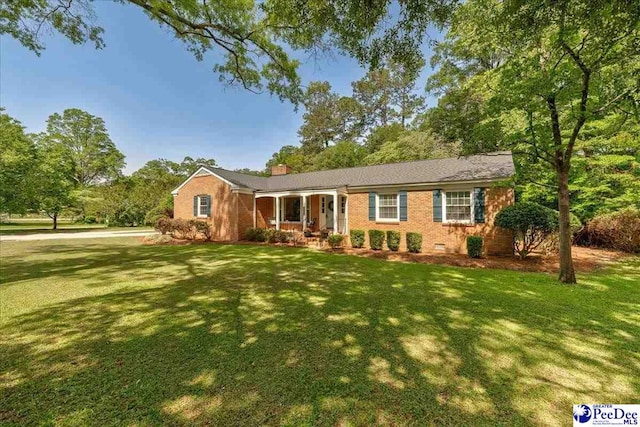 128 Holly Dr, Hartsville, SC 29550 - ranch-style home with a porch, a front yard, a chimney, and brick siding
