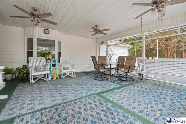 view of patio featuring ceiling fan