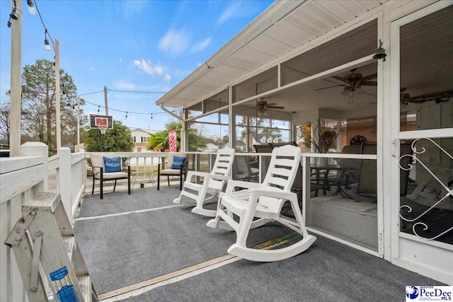 view of patio / terrace featuring ceiling fan