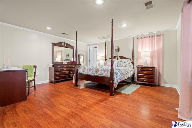 bedroom featuring crown molding and wood-type flooring