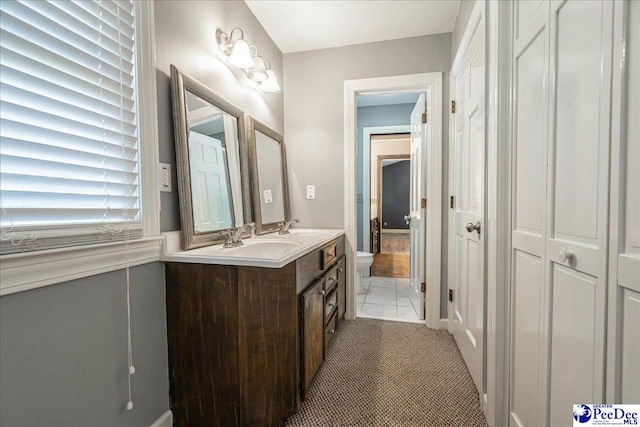 3309 W Forest Lake Dr, Florence, SC 29501 - bathroom with vanity, tile patterned flooring, and toilet