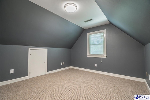 3309 W Forest Lake Dr, Florence, SC 29501 - additional living space with lofted ceiling and carpet