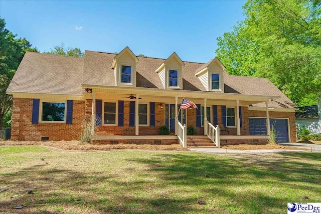 3309 W Forest Lake Dr, Florence, SC 29501 - cape cod home with a porch, a garage, central AC unit, and a front yard