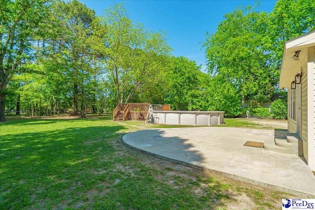 3309 W Forest Lake Dr, Florence, SC 29501 - view of yard with a pool side deck and a patio area