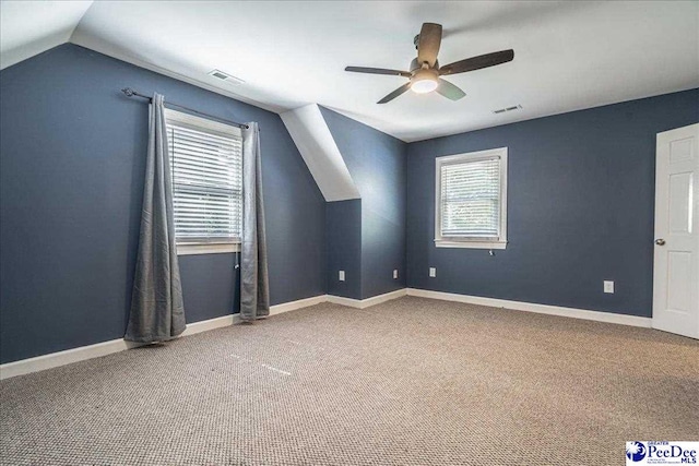 3309 W Forest Lake Dr, Florence, SC 29501 - bonus room with a wealth of natural light, carpet floors, ceiling fan, and vaulted ceiling