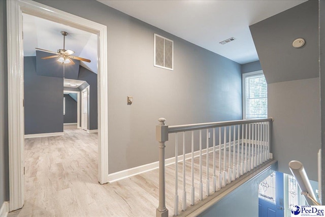 3309 W Forest Lake Dr, Florence, SC 29501 - hall featuring lofted ceiling and light hardwood / wood-style floors