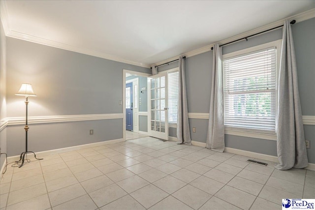 3309 W Forest Lake Dr, Florence, SC 29501 - empty room with ornamental molding and light tile patterned flooring