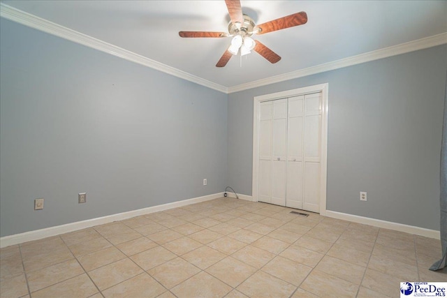3309 W Forest Lake Dr, Florence, SC 29501 - unfurnished bedroom with ornamental molding, light tile patterned flooring, ceiling fan, and a closet