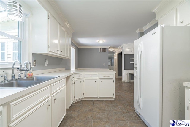 3309 W Forest Lake Dr, Florence, SC 29501 - kitchen featuring white cabinetry, white refrigerator with ice dispenser, sink, and ornamental molding