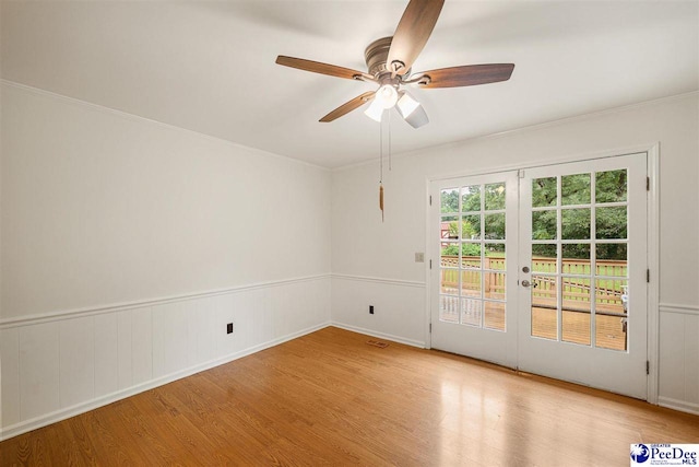 2 Bayswater Rd, Quinby, SC 29506 - unfurnished room with crown molding, light hardwood / wood-style floors, french doors, and ceiling fan