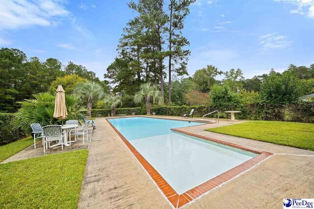 2 Bayswater Rd, Quinby, SC 29506 - view of pool with a lawn and a patio area