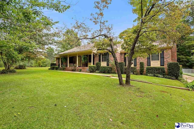 2 Bayswater Rd, Quinby, SC 29506 - ranch-style home featuring a front lawn
