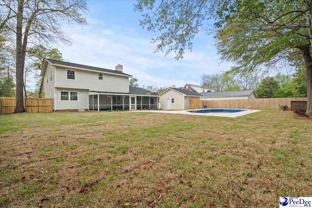 1844 Joseph Cir, Florence, SC 29501 - rear view of house with a sunroom and a chimney