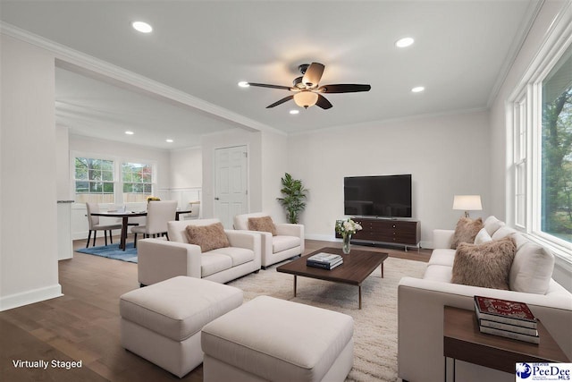 1844 Joseph Cir, Florence, SC 29501 - living room featuring wood finished floors, recessed lighting, ceiling fan, baseboards, and crown molding